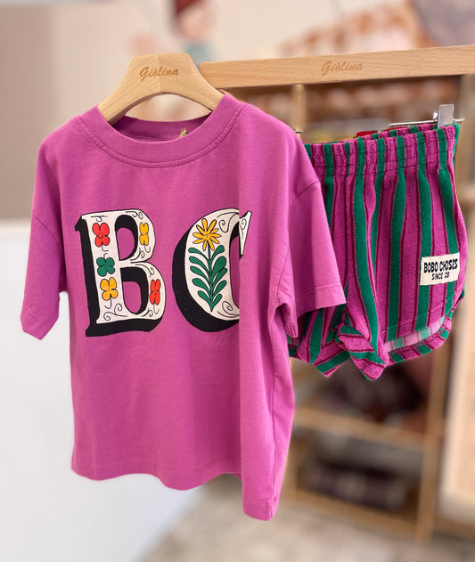 T-shirt logata “ B C “ fiori e bermuda rigato