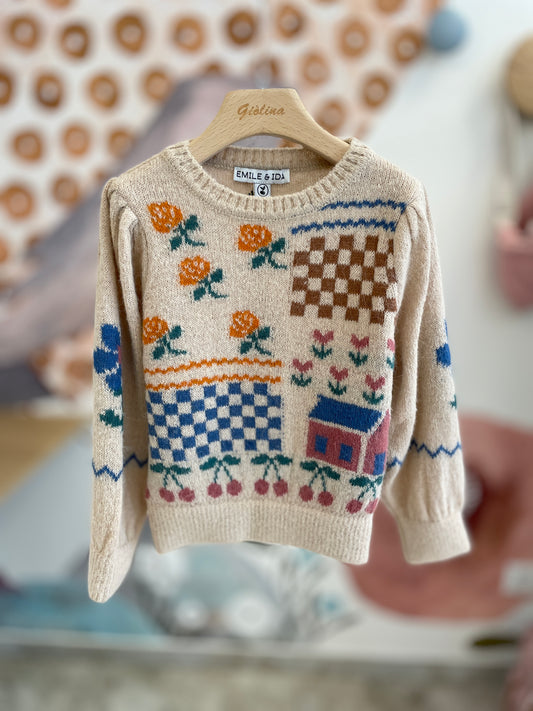 Pullover con casette e fiorellini