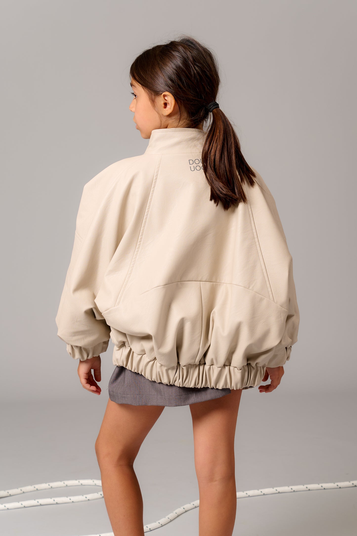 Bomber ecopelle beige con zip