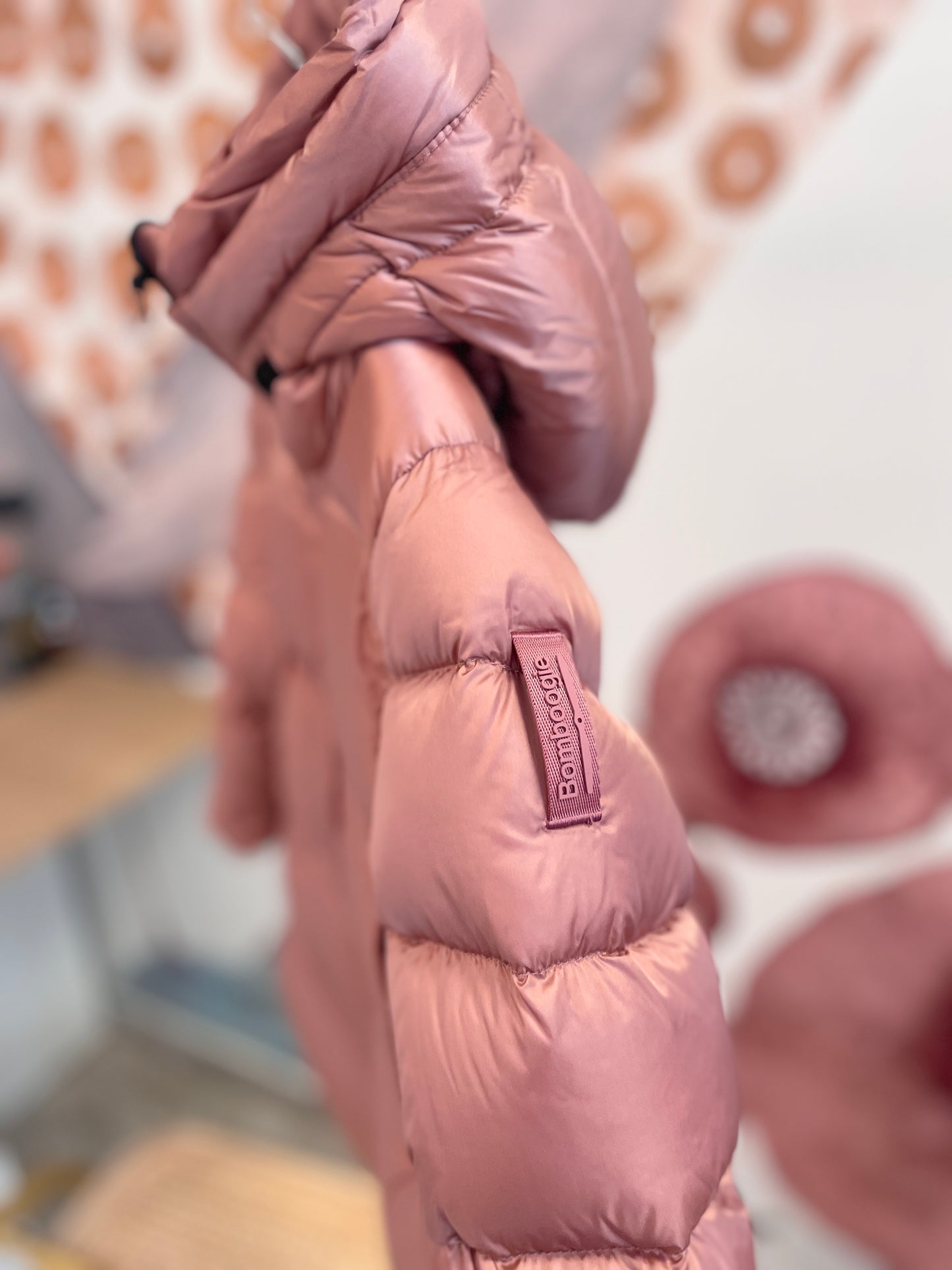 Piumino lungo con doppio cursore rosa fard