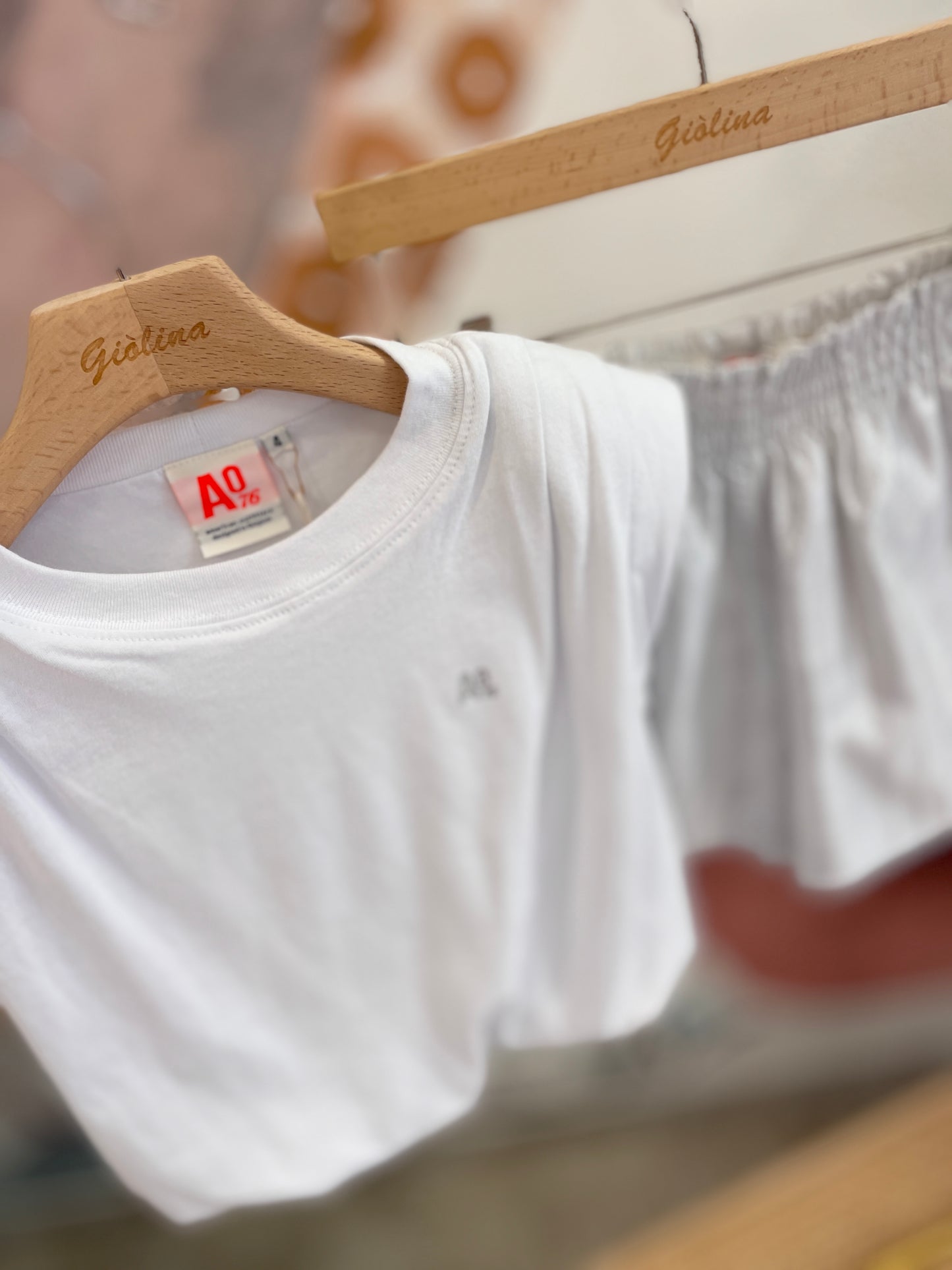 Top rimborsato con shorts argento