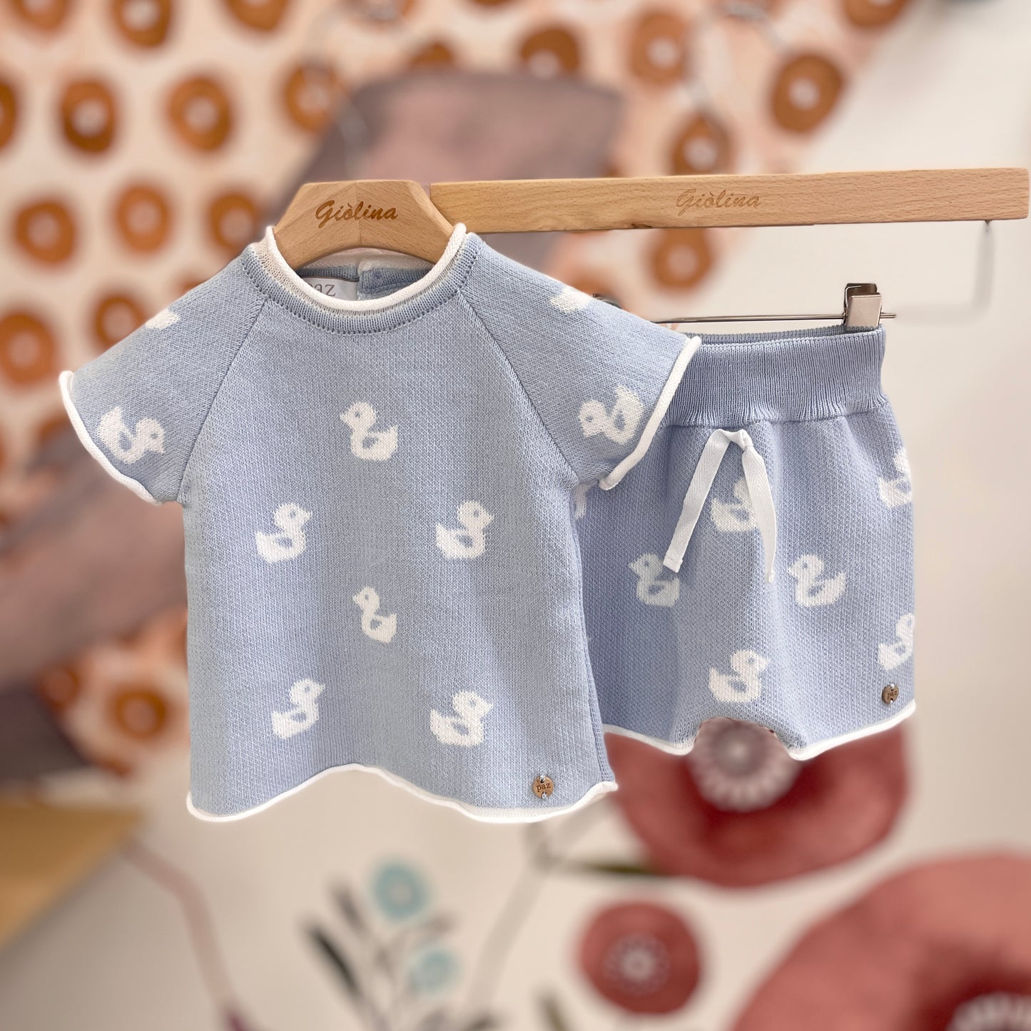 Completi baby rosa e azzurro con paperelle