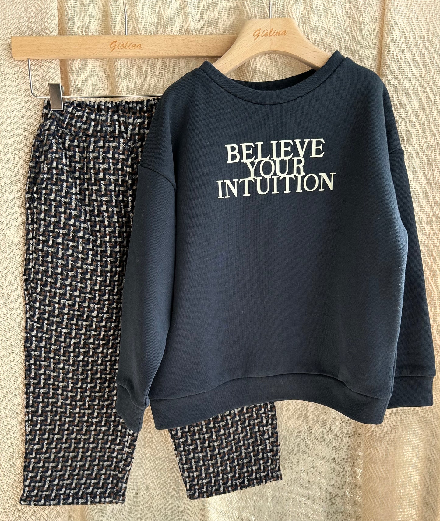 Tuta "Believe your intuition" componibile